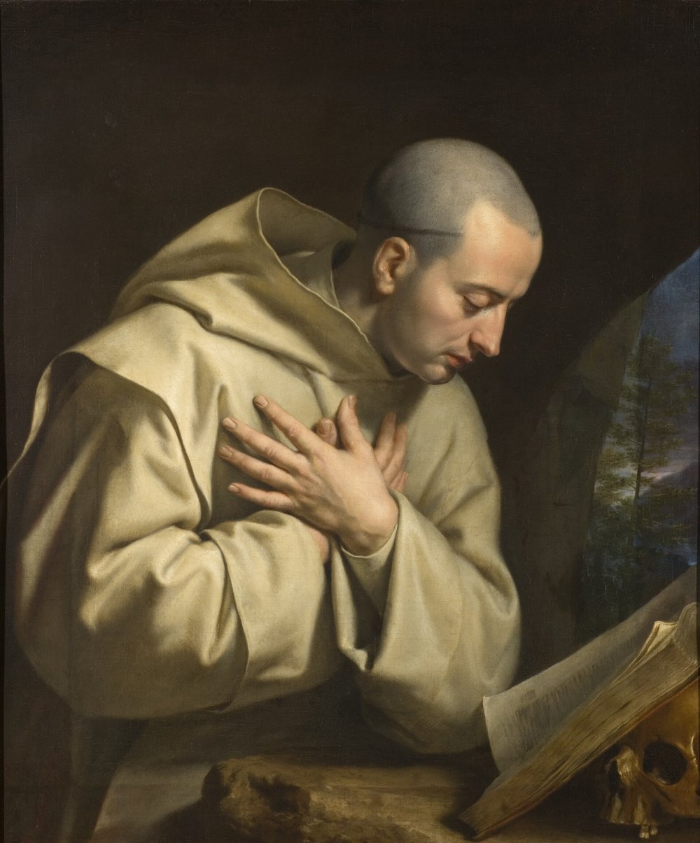 Saint Bruno of Cologne, painting by Philippe de Champaigne: a Carthusian monk in a white habit, hands crossed on his breast, looking at an open book beside a skull