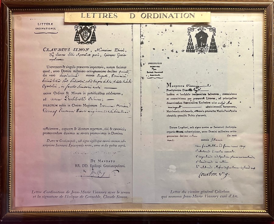 The ordination letter of John Mary Vianney, a manuscript document displayed in the presbytery at Ars